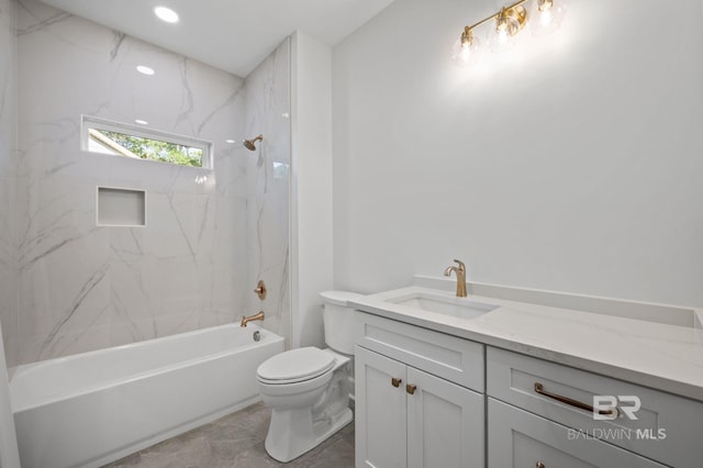 12380 Mannich Ln, Foley, AL 36580 - full bathroom with vanity, toilet, tub / shower combination, and marble look tiles
