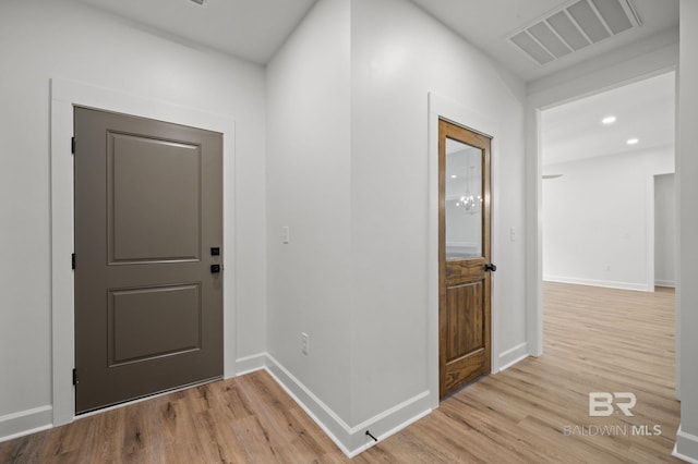 12380 Mannich Ln, Foley, AL 36580 - entryway with wood finished floors, baseboards, and recessed lighting