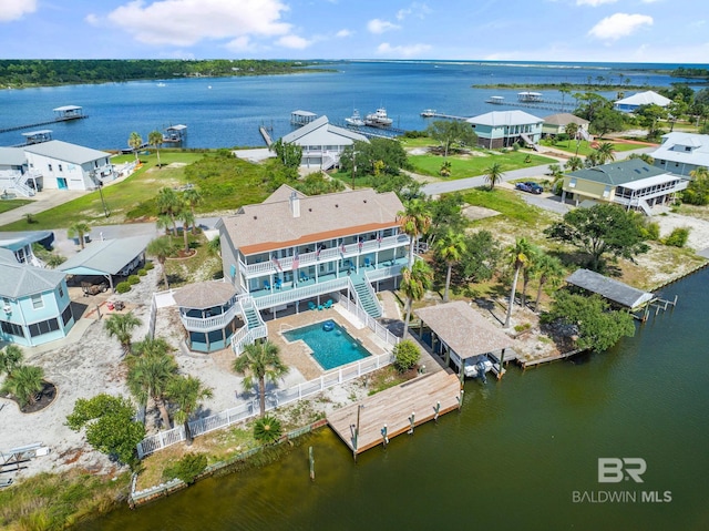 birds eye view of property featuring a water view