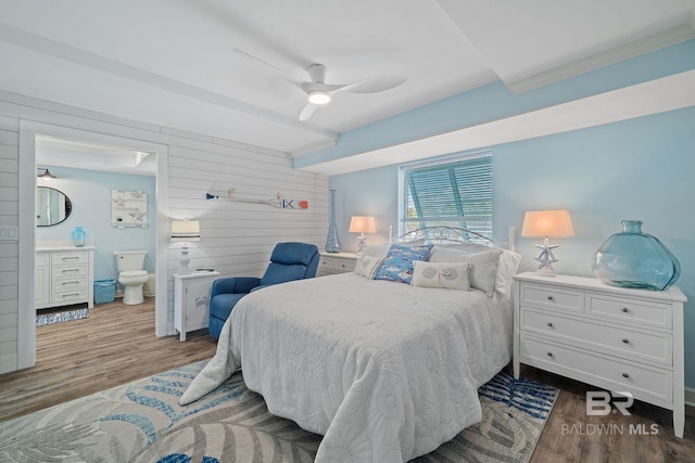 bedroom featuring hardwood / wood-style flooring, ensuite bath, and ceiling fan