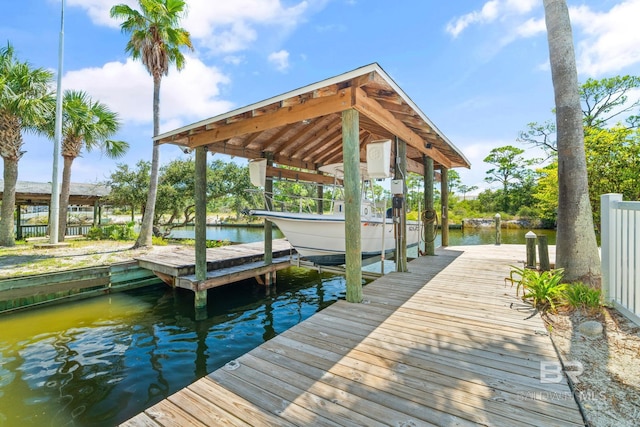 view of dock with a water view