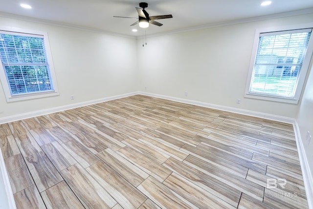 unfurnished room with light hardwood / wood-style floors, crown molding, and ceiling fan