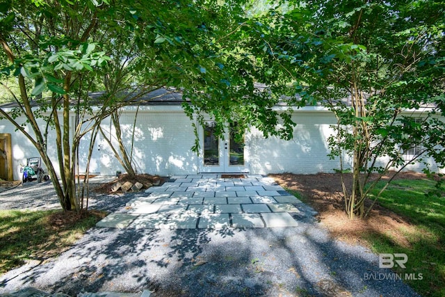 view of front facade featuring french doors