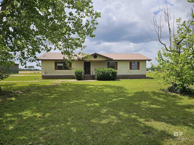 59575 Lottie Rd, Atmore, AL 36502 - view of front of home featuring a front yard and metal roof