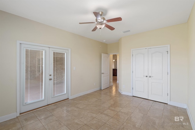 unfurnished bedroom featuring french doors, access to exterior, light tile patterned floors, and ceiling fan