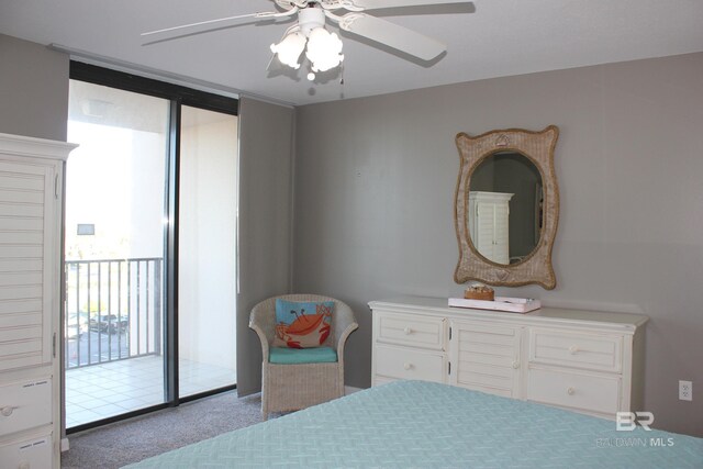 carpeted bedroom with ceiling fan and access to exterior