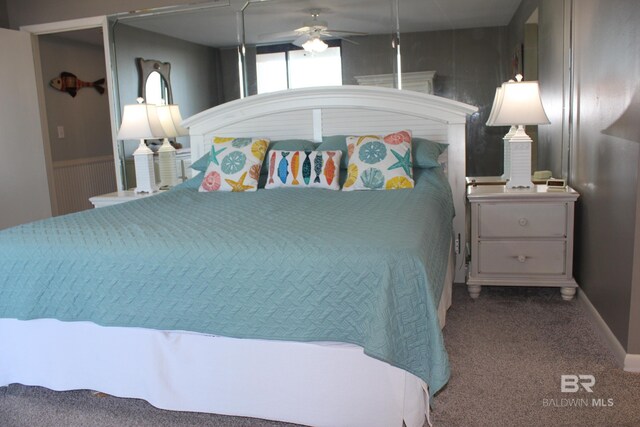 carpeted bedroom with ceiling fan