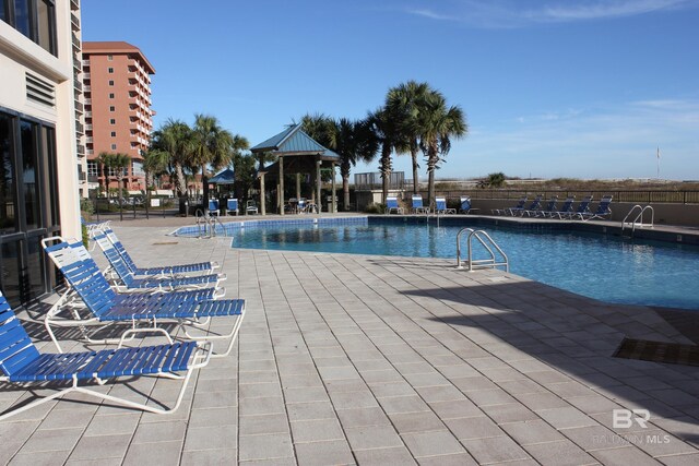 view of pool with a patio