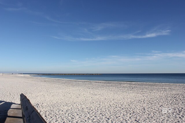 property view of water featuring a view of the beach