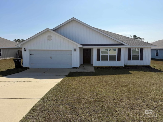 single story home featuring a garage and a front lawn