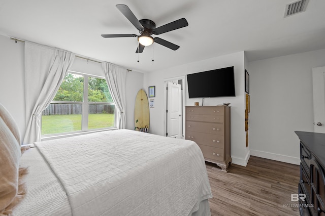 3931 Langley Ave, Foley, AL 36535 - bedroom with wood finished floors and a ceiling fan