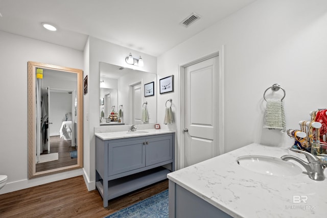 3931 Langley Ave, Foley, AL 36535 - bathroom with vanity and wood finished floors
