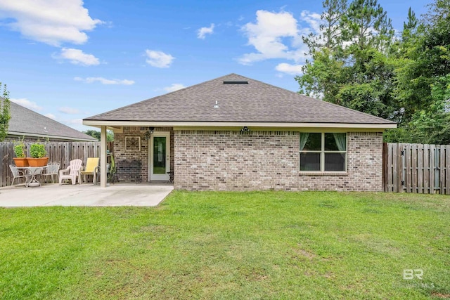 3931 Langley Ave, Foley, AL 36535 - rear view of property with a patio, brick siding, and a shingled roof