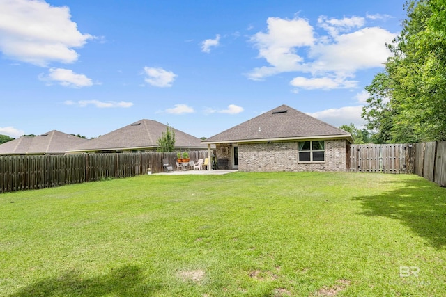 3931 Langley Ave, Foley, AL 36535 - fenced backyard with a patio area