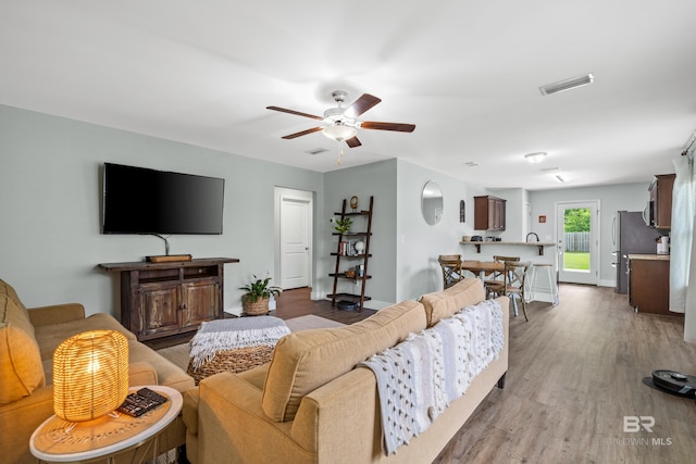 3931 Langley Ave, Foley, AL 36535 - living area with ceiling fan and wood finished floors
