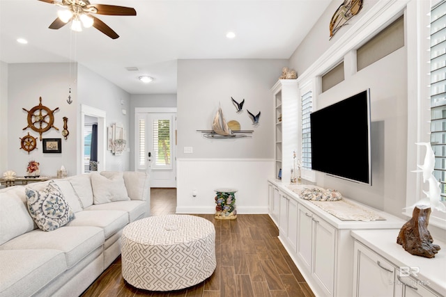 living area with recessed lighting, baseboards, ceiling fan, and dark wood-style flooring