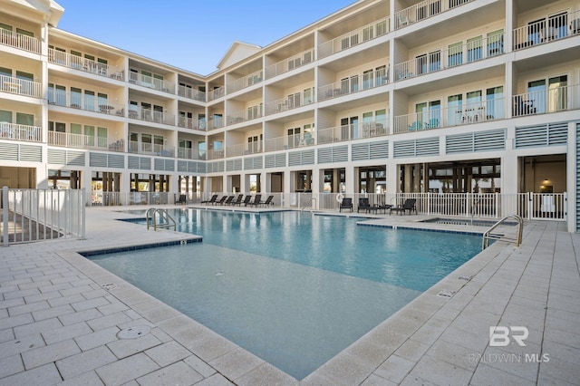 pool with a patio area