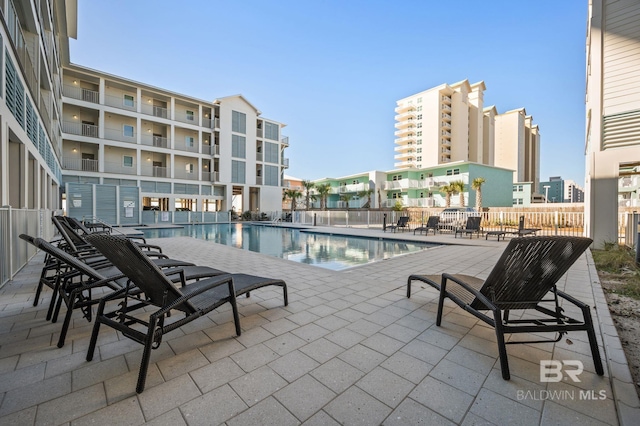 community pool featuring a patio