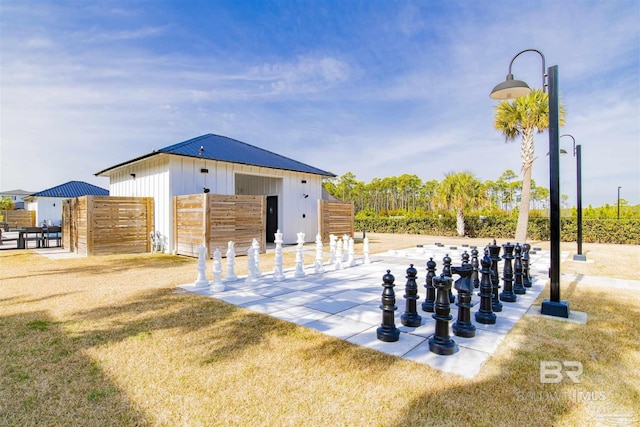 surrounding community featuring an outbuilding and an exterior structure