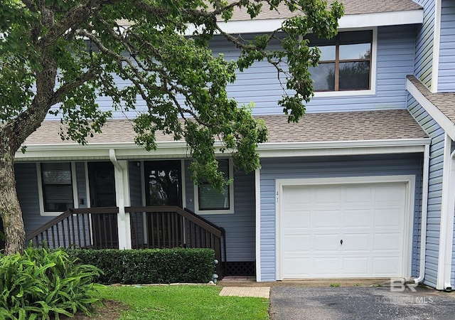 view of front of property featuring a garage