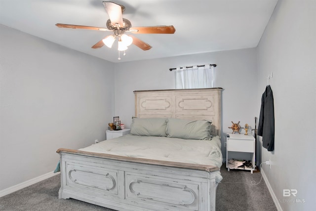 bedroom featuring dark colored carpet and ceiling fan