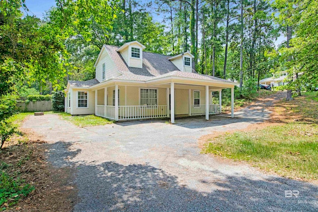 farmhouse inspired home featuring a porch