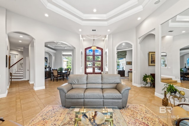 tiled living room featuring ornamental molding