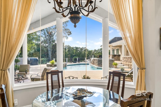 dining area featuring a chandelier