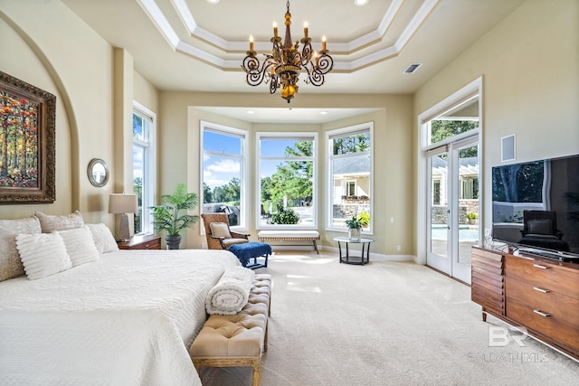 bedroom featuring light carpet, a notable chandelier, a tray ceiling, access to exterior, and ornamental molding