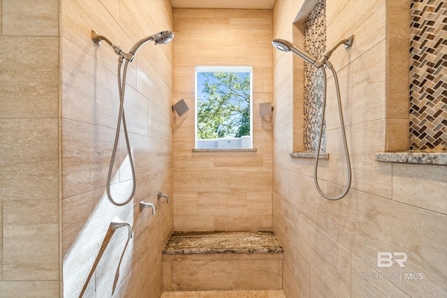 bathroom featuring tiled shower