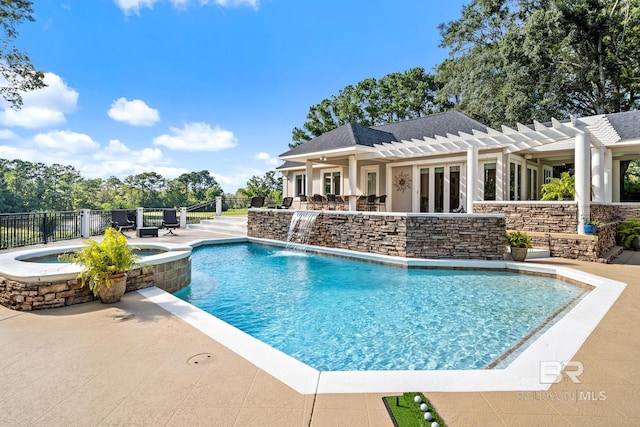 view of pool with an in ground hot tub, pool water feature, a pergola, and a patio