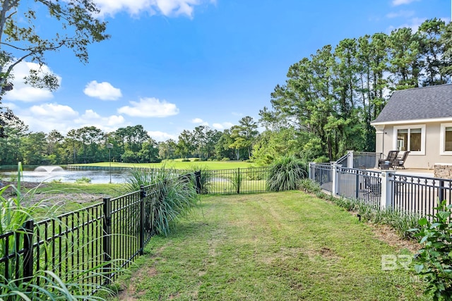 view of yard with a water view