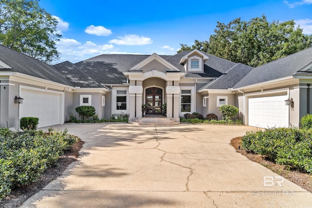 view of front of property featuring a garage