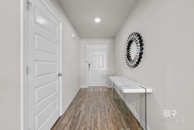 hallway featuring dark wood-type flooring