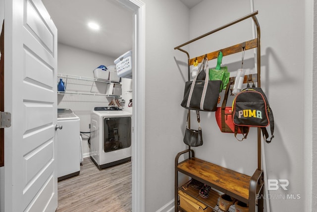 interior space featuring light hardwood / wood-style floors and independent washer and dryer