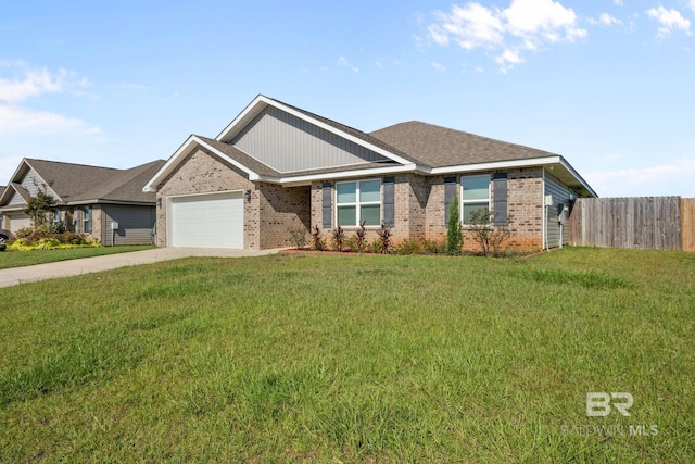 view of front of house featuring a garage and a front lawn