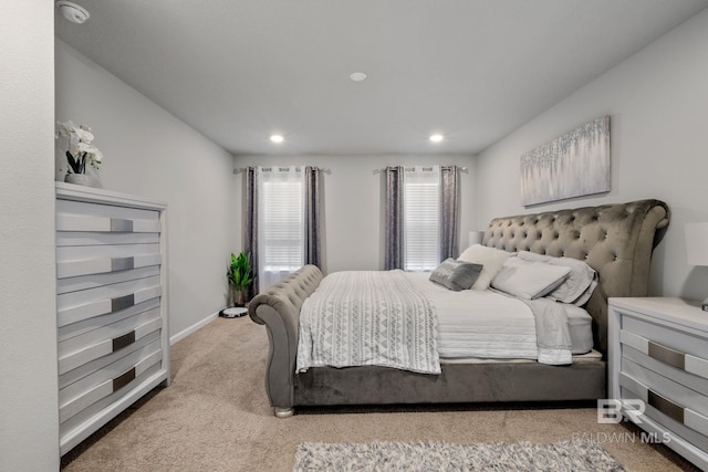 bedroom featuring light carpet