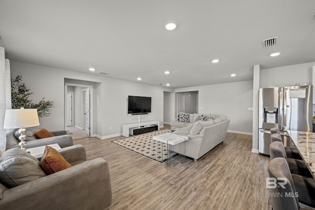 living room featuring light hardwood / wood-style floors