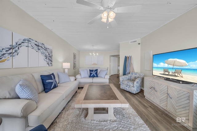 living room with wooden ceiling, wood-type flooring, and ceiling fan with notable chandelier