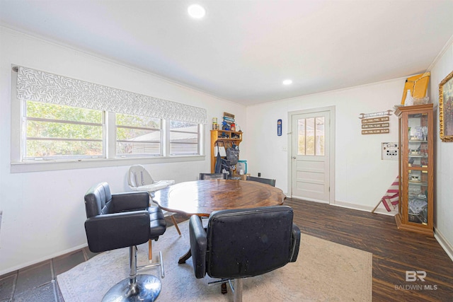 dining area with dark wood-type flooring