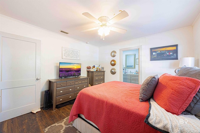 bedroom with dark wood-type flooring, ceiling fan, ornamental molding, and ensuite bathroom