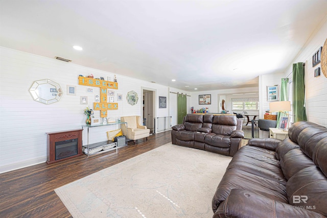 living room featuring dark wood-type flooring