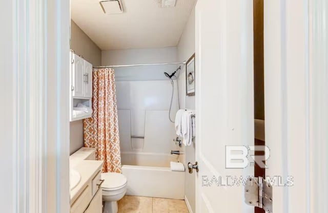 full bathroom featuring vanity, shower / tub combo, toilet, and tile flooring