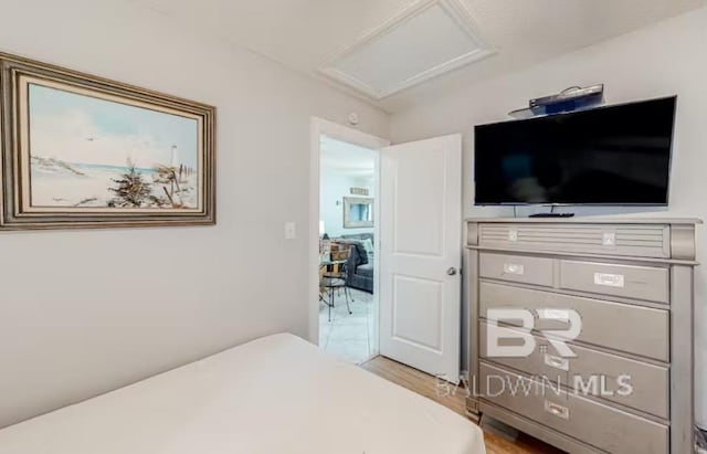 bedroom with light hardwood / wood-style flooring