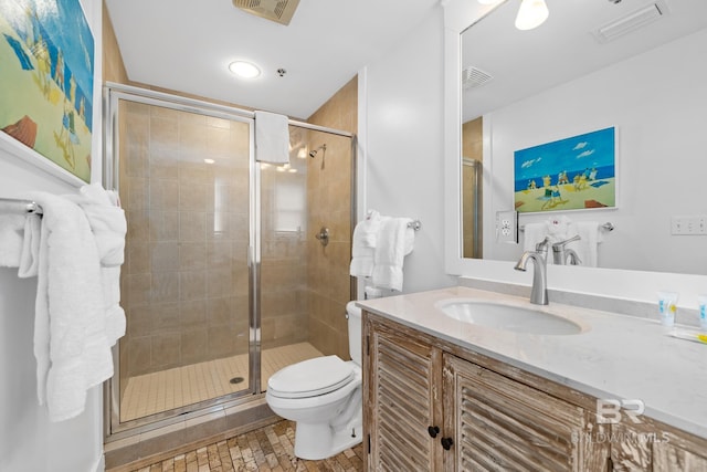 full bath with toilet, a shower stall, and visible vents