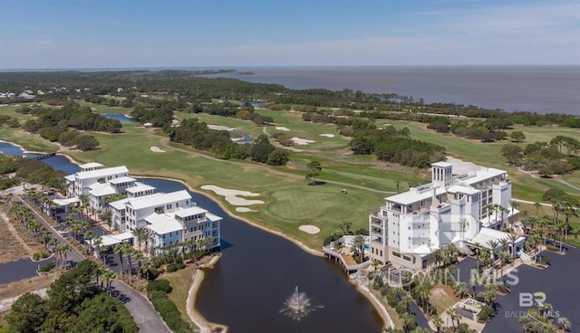 bird's eye view featuring view of golf course and a water view