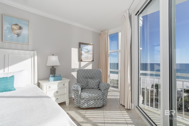 tiled bedroom featuring a water view and ornamental molding