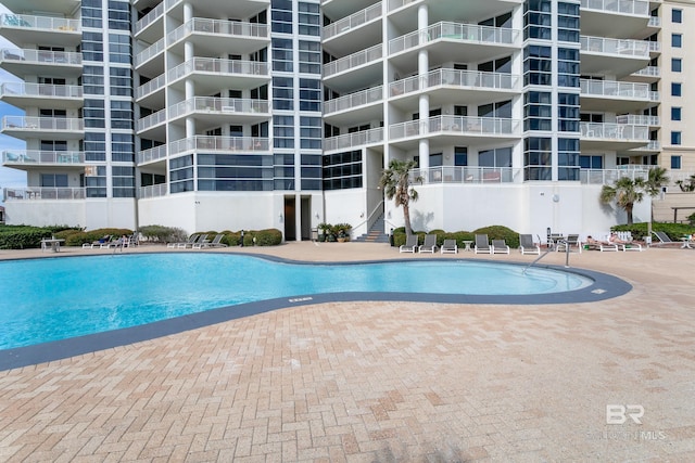 view of pool with a patio