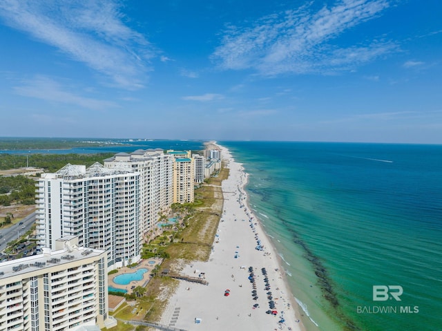 aerial view featuring a water view and a beach view