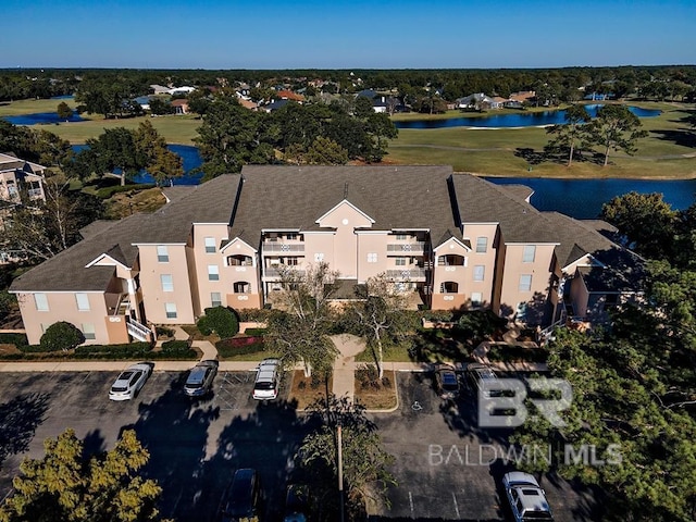 bird's eye view with a water view